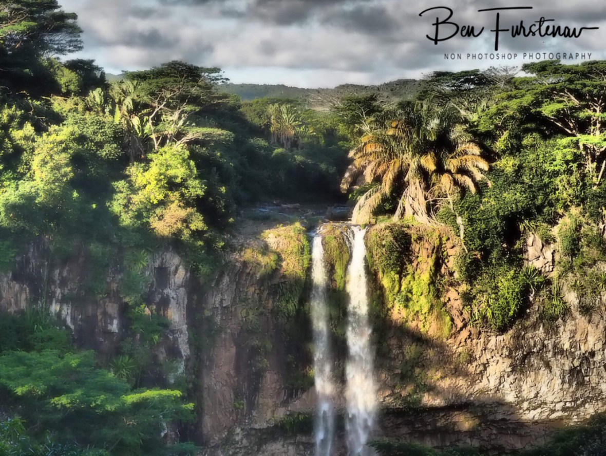 A jungle waterfall at 7 coloured earth.