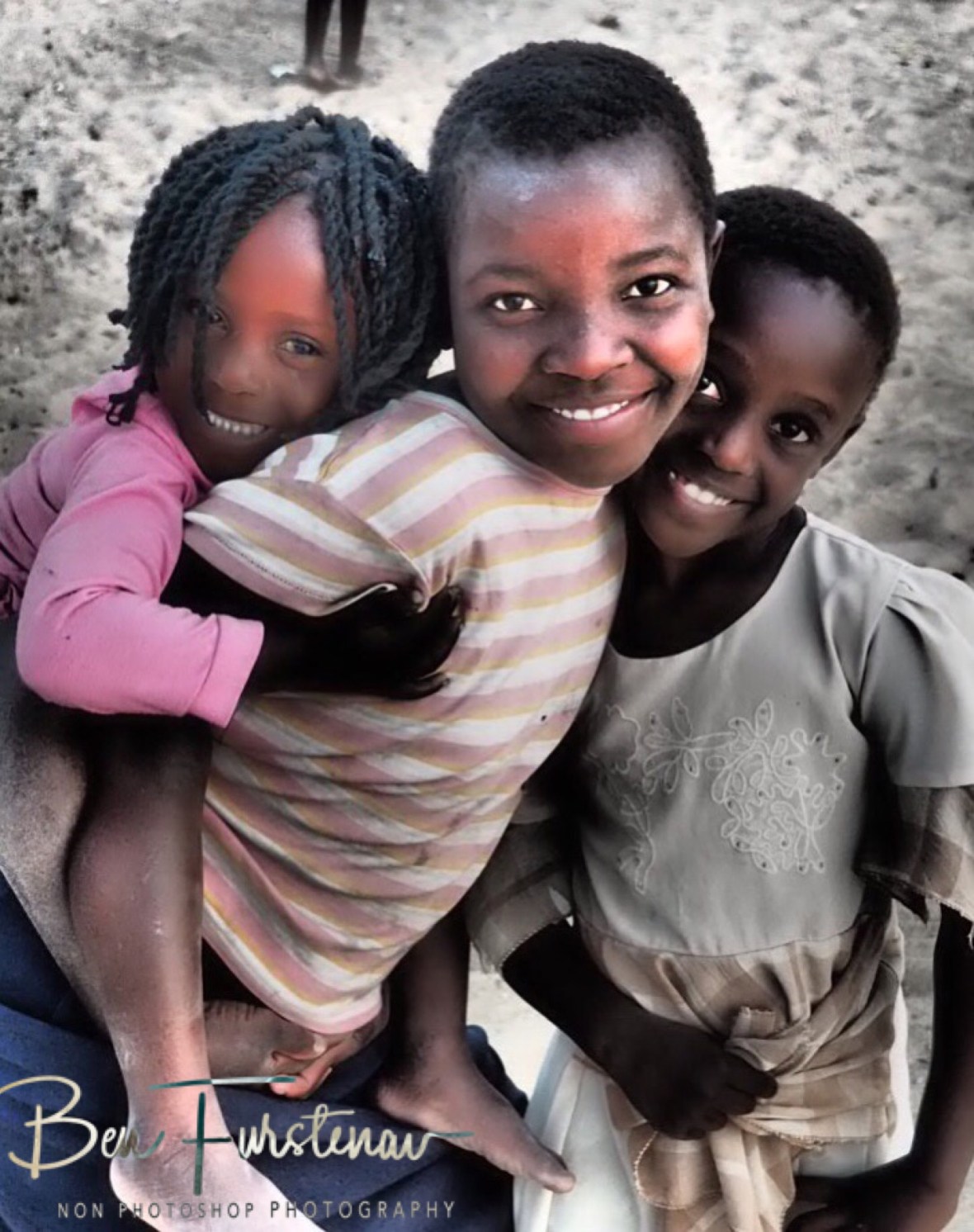 Cute girls posing in Chembe, Cape Maclear, Lake Malawi, Malawi