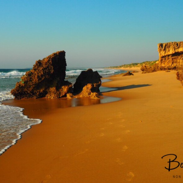 Early morning walk along a remote beach, Barra beach, Inhambane, Mozambique