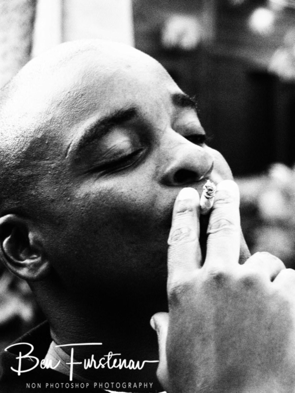 Maela enjoys the smoke, Inhambane, Mozambique