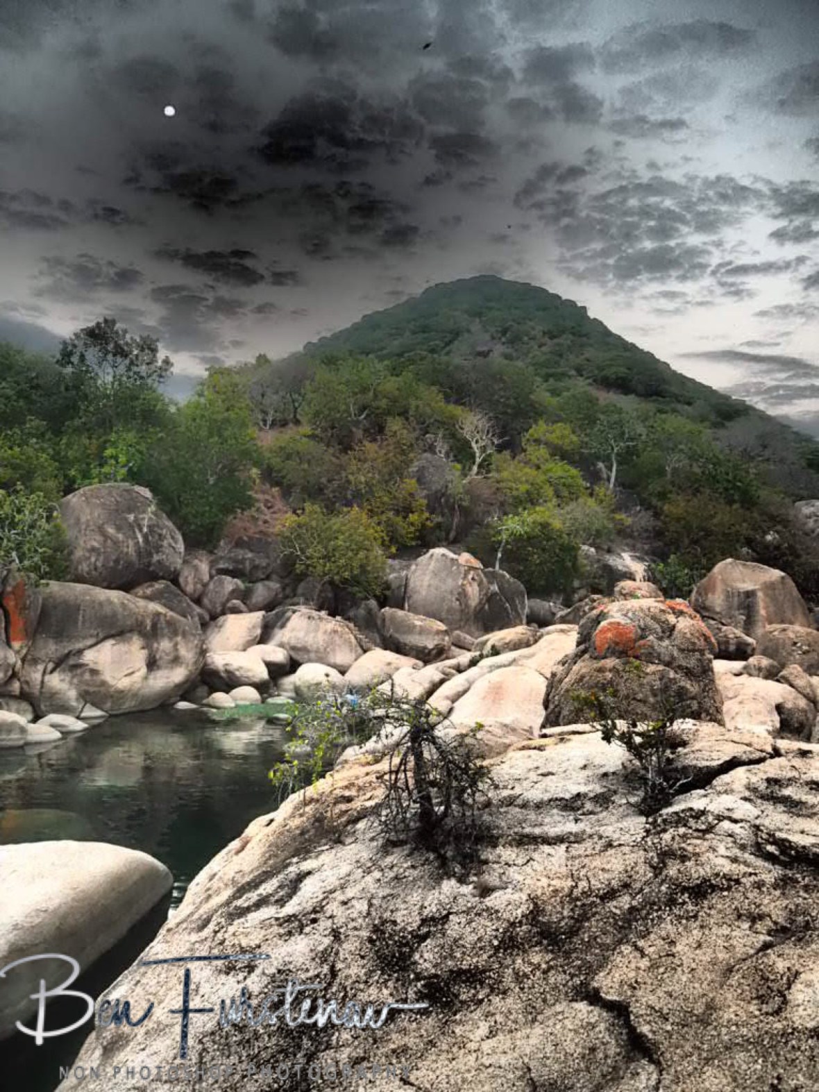 Moon coming up behind the mountains at Otter Point, Cape MaClear, Lake Malawi, Malawi 