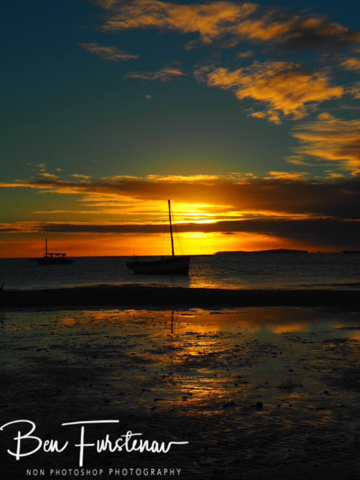 Dhow sunrise in tidal waters, Vilankulo, Mozambique