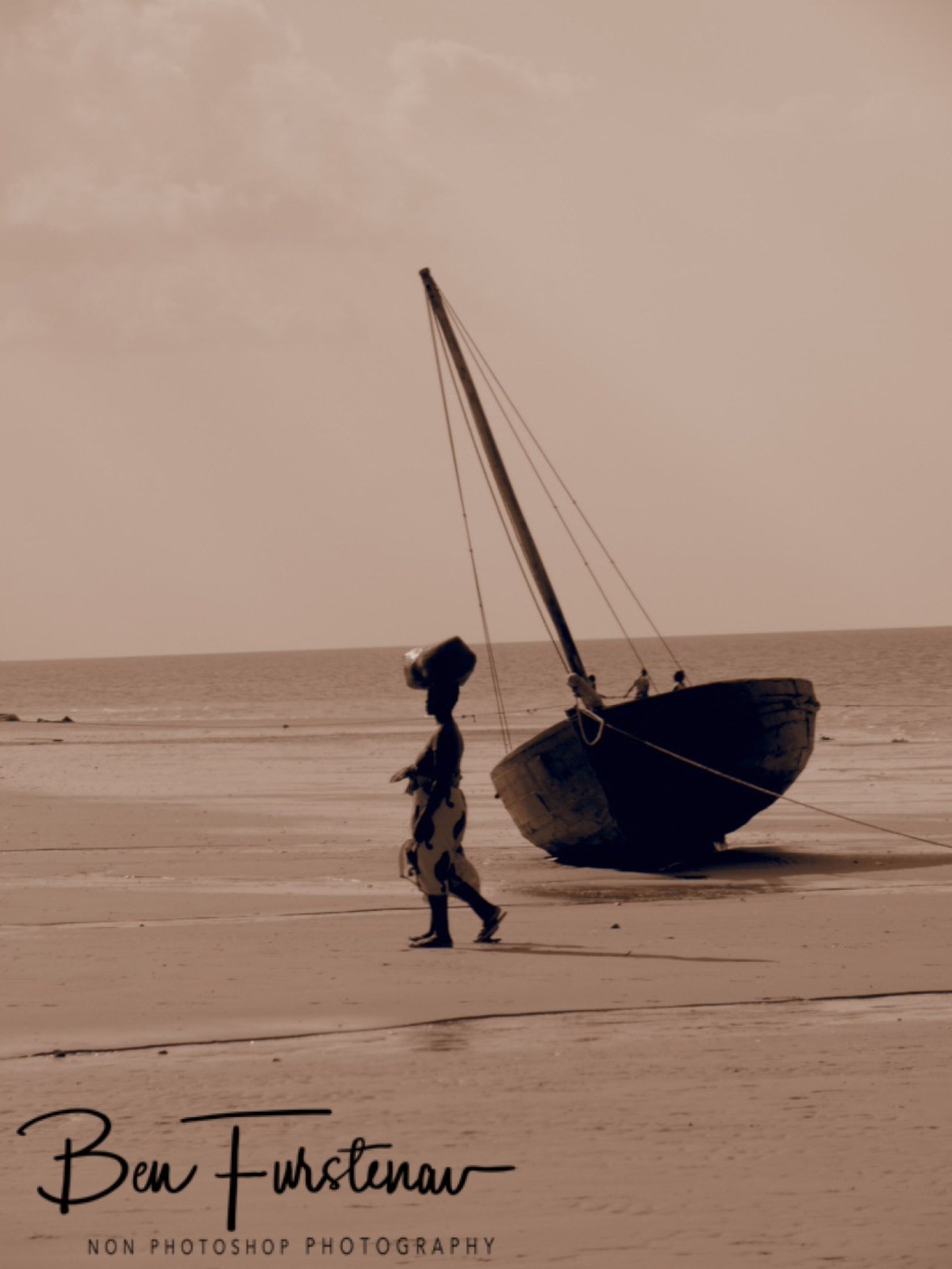 Woman and dhow in sepia, Vilankulo, Mozambique