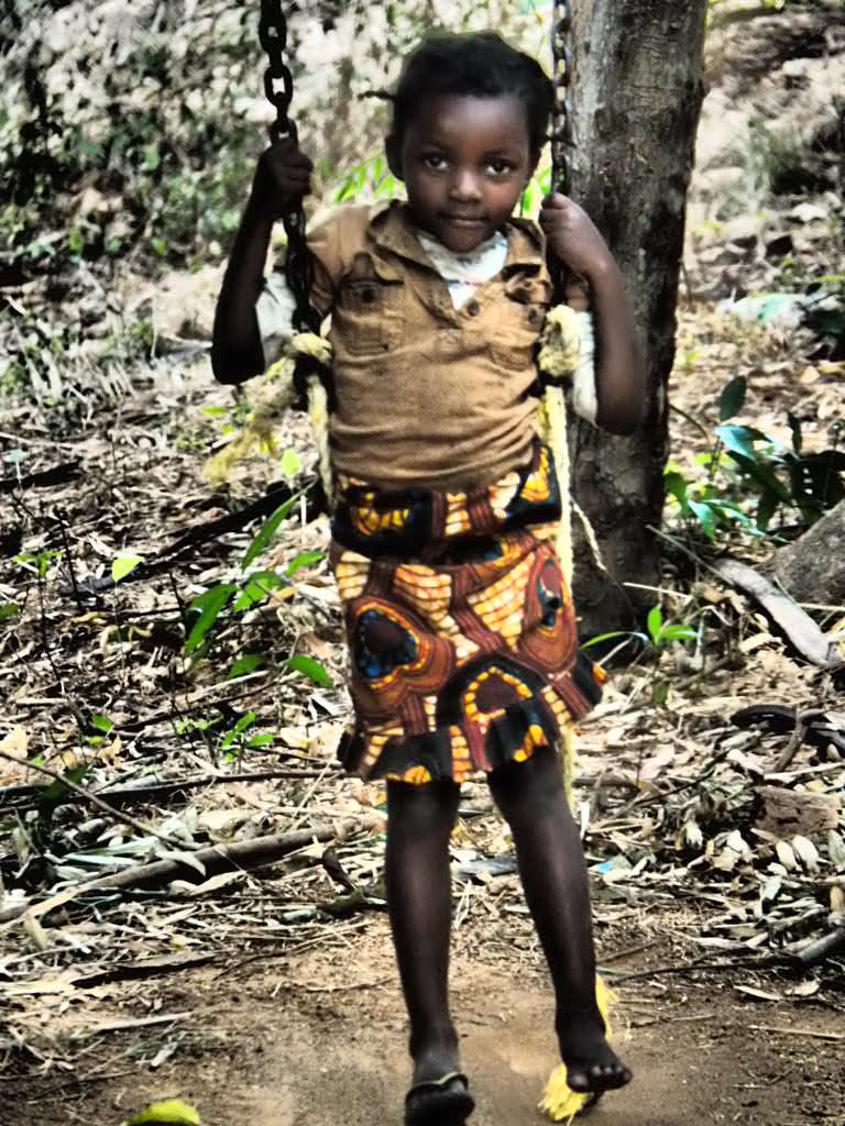 Not quite sure about a zebra on her playground, Nhakata Bay, Malawi 