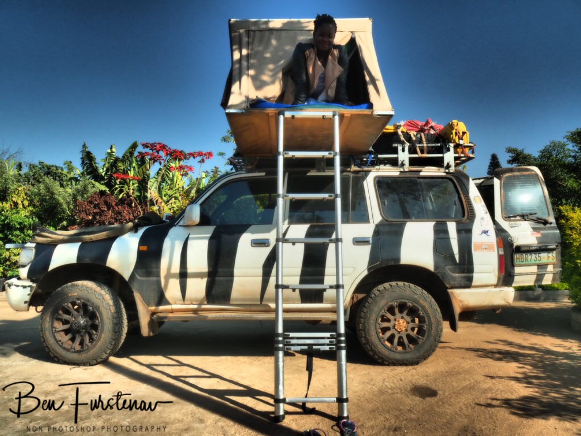 Manuela checking out Zimba’s rooftop tent, Lilongwe, Malawi 