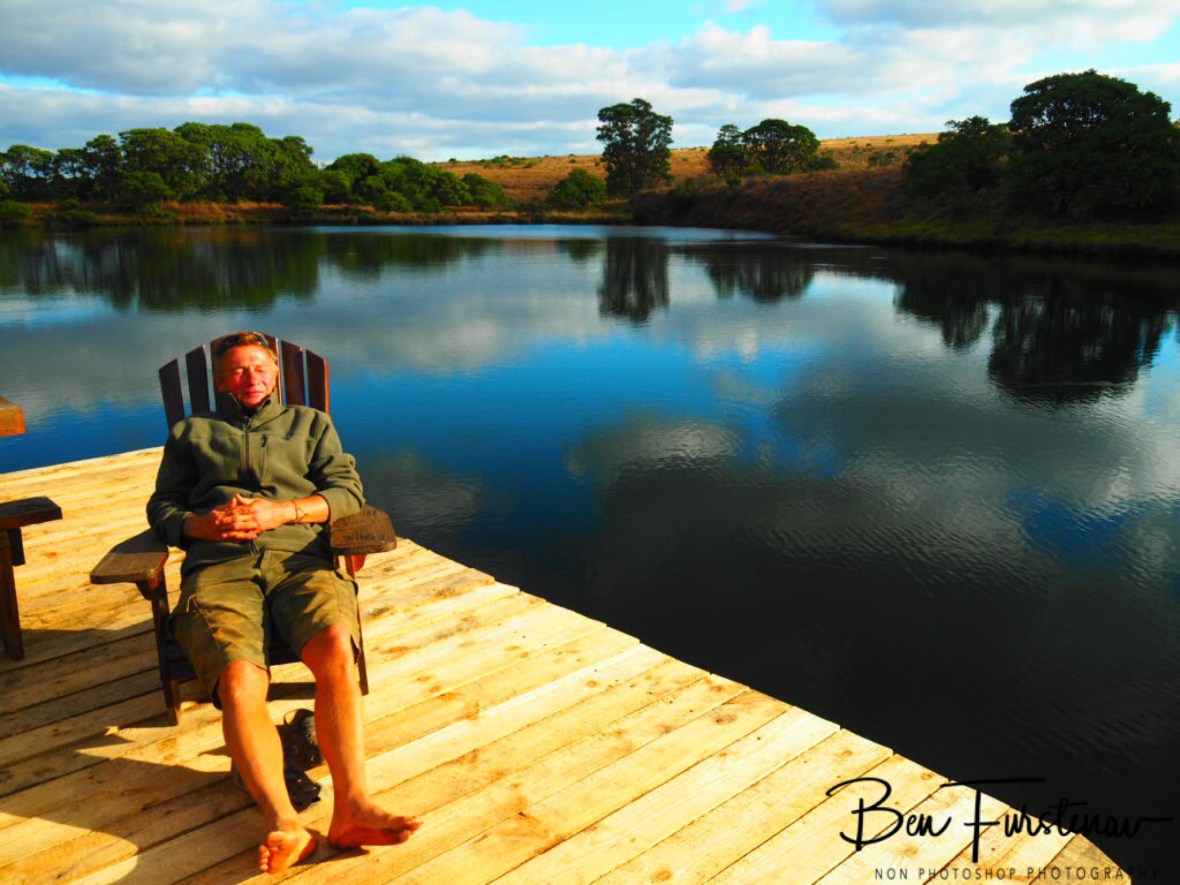 Enjoying a few sun rays with dirty, dusty feet, Chelinde lodge, Nyika National Park, Malawi 