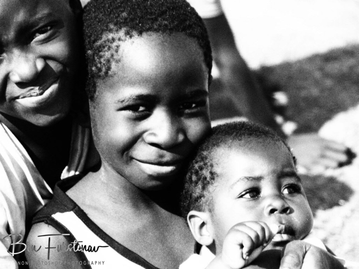 Family smiles in Lukulu, Zambia 