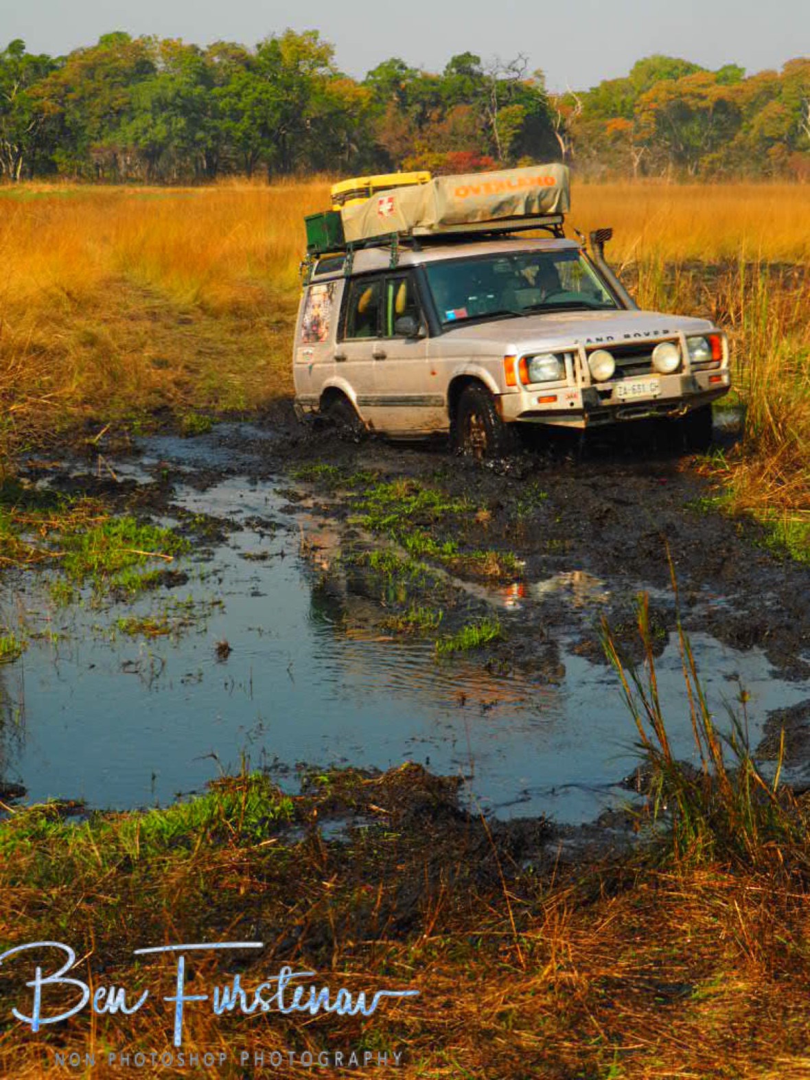 Jean Carlos Landrover battling mud in Liuwa Plains National Park, Zambia 