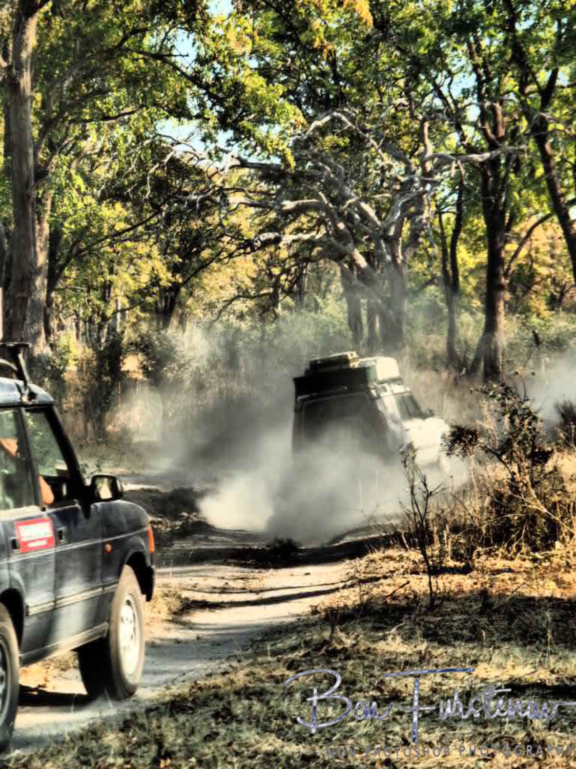 Driving dust tracks, Okavango Delta, Chobe National Park, Botswana