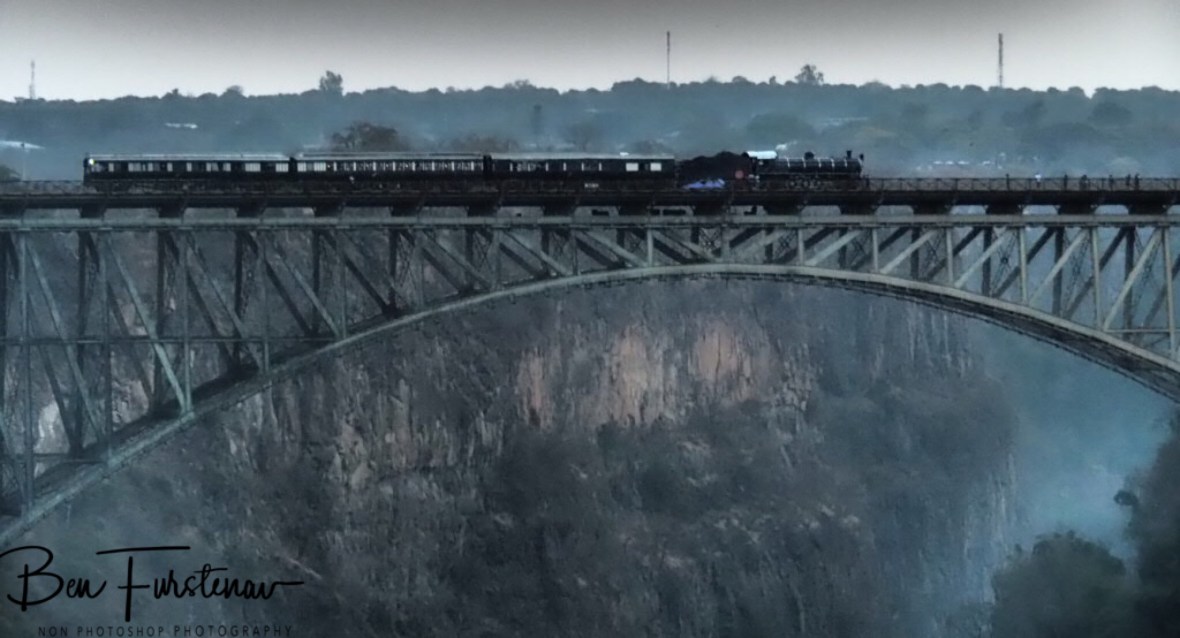 Steam train over the Victoria Falls, Zambia 