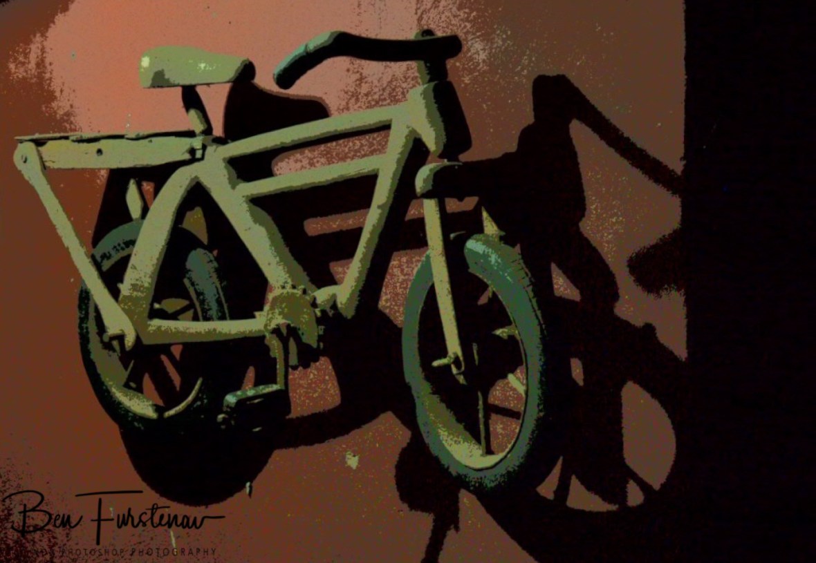 Wooden bike over fireplace at Thorn Tree Lodge, Livingstone, Zambia 