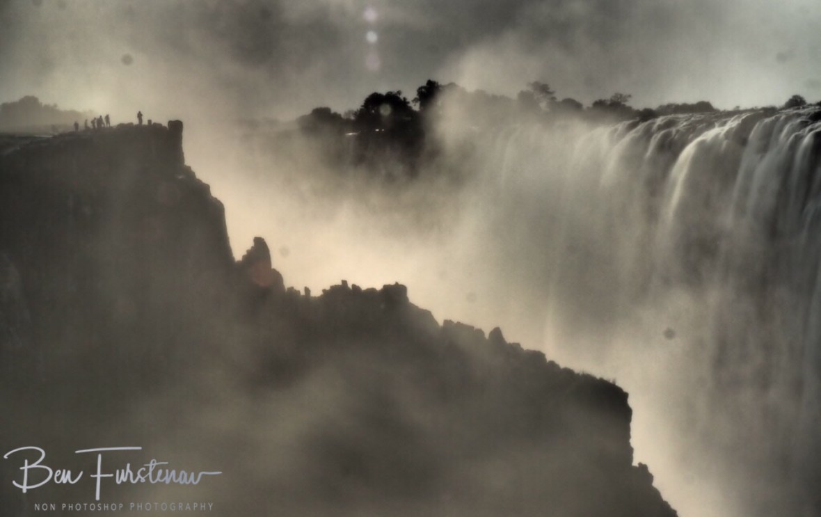 Spectators on the Zimbabwen side at Victoria Falls, Zambia 