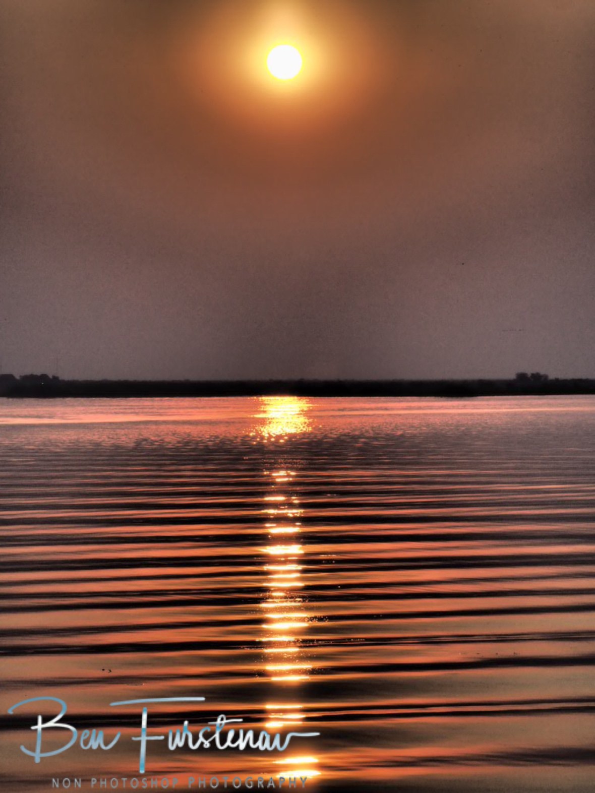 Waves curling over the surface, Chobe River, Kasane, Botswana 