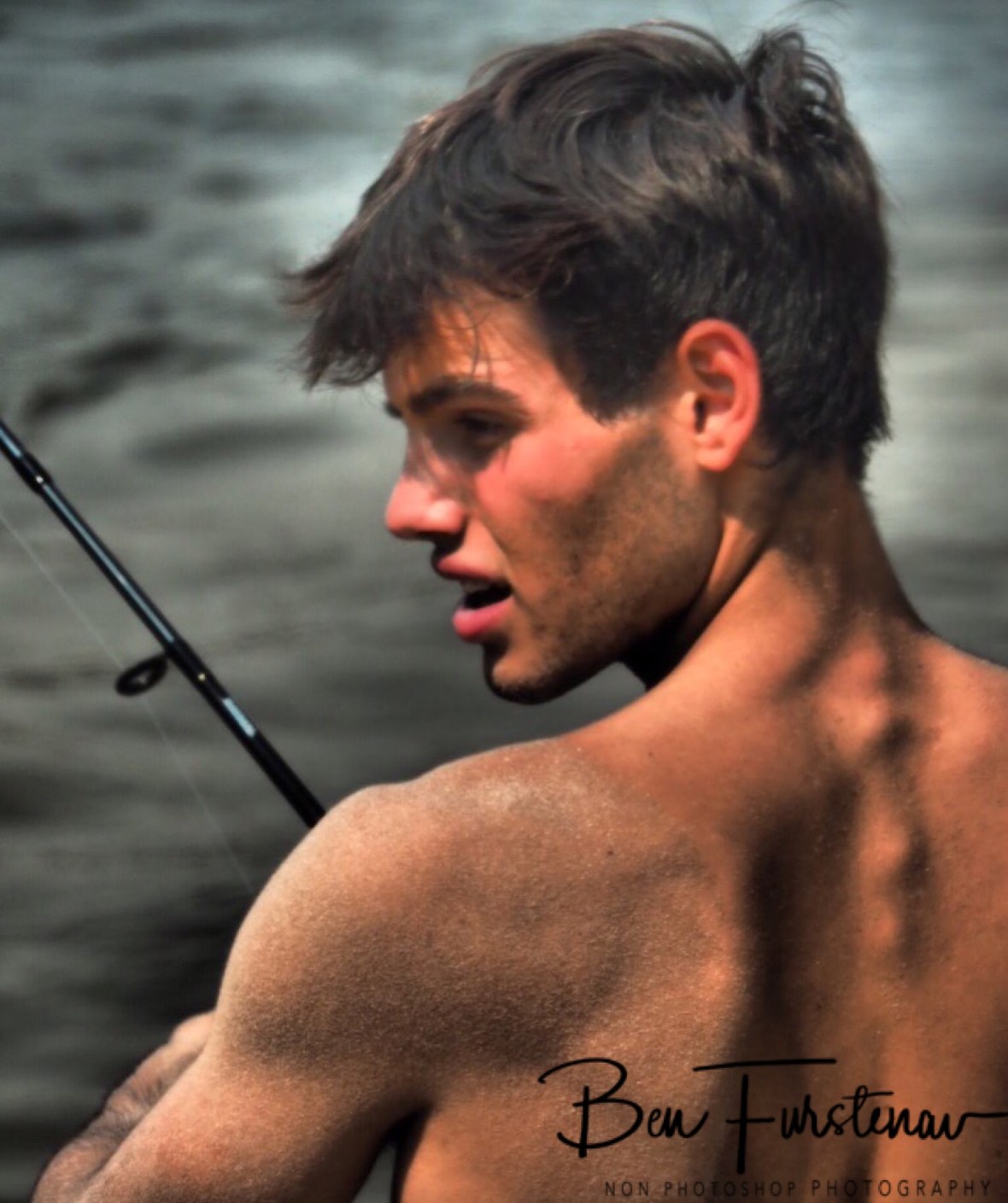 Eduardo with fishing rod, Sioma Falls, Zambia 