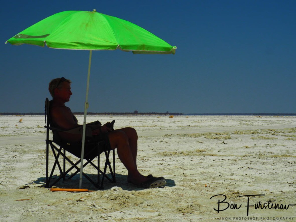 It’s good to have an umbrella, Makgadikgadi Salt Pans, Botswana 
