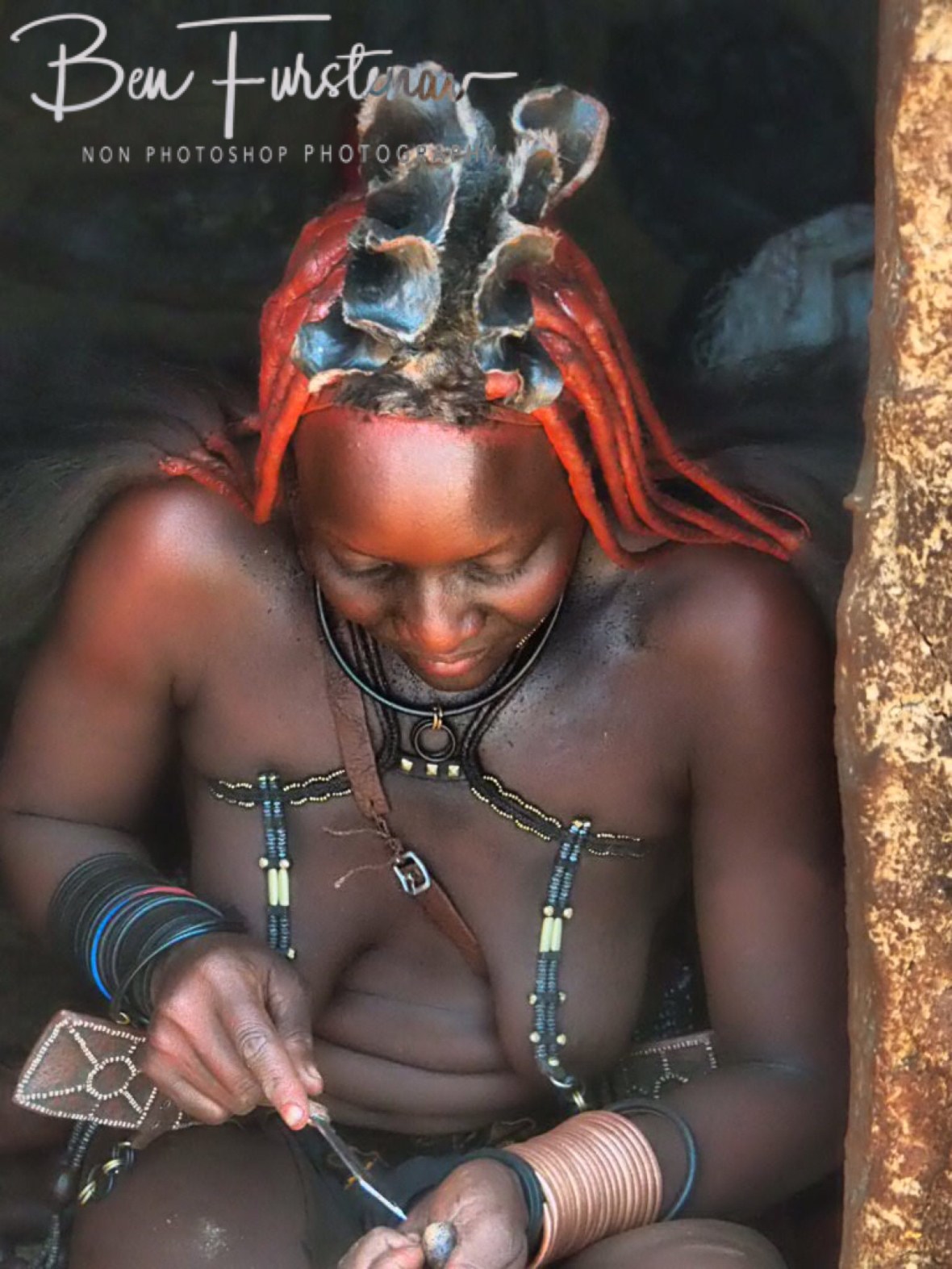 Making jewellery, Omusaona Himba Village, Kamanjab, Namibia