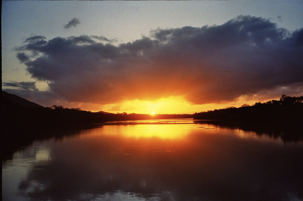 Calm sunrise over the Endeavour River in Cooktown, Queensland, Australia