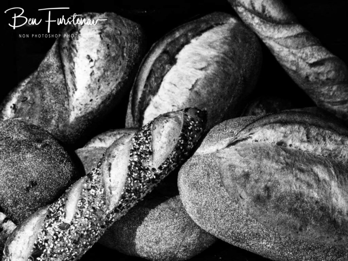 A basket of freshly baked sourdough bread selection, Newrybar, New South Wales, Australia
