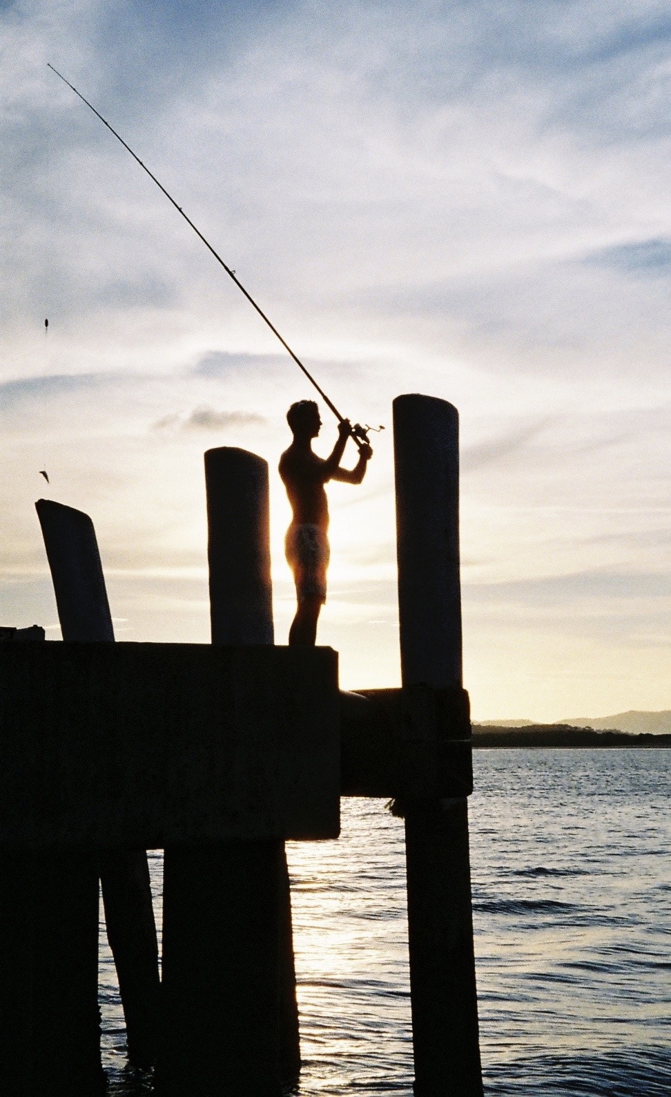 Fishing off Cooktown’s jetty, Queensland, Australia