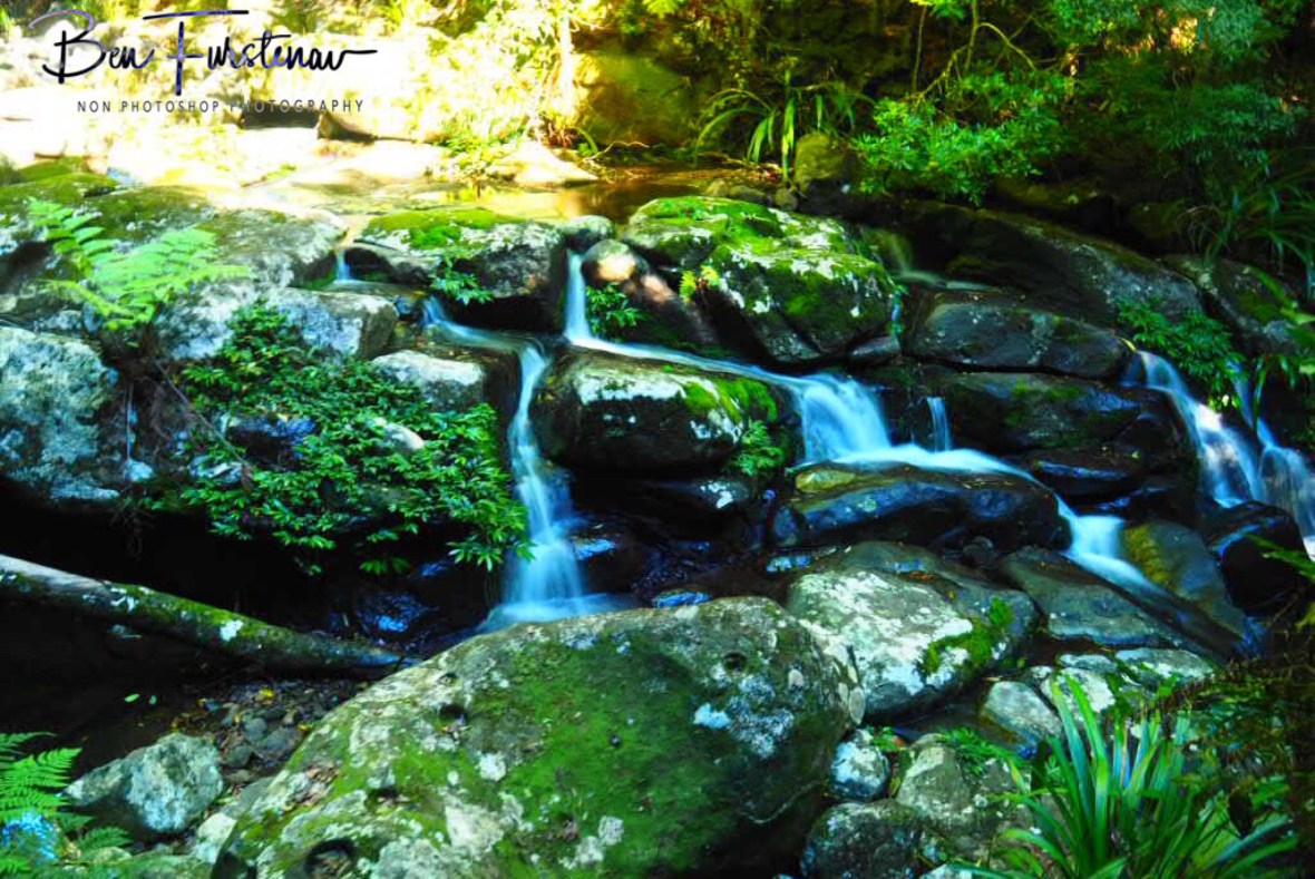 Cascading along boulders at Lamington National Park, Queensland, Australia 
