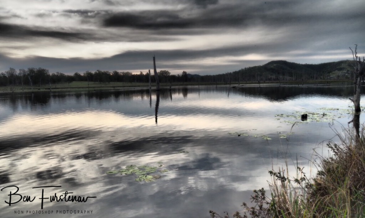 Cloudy reflections at Lake Somerset, Queensland, Australia