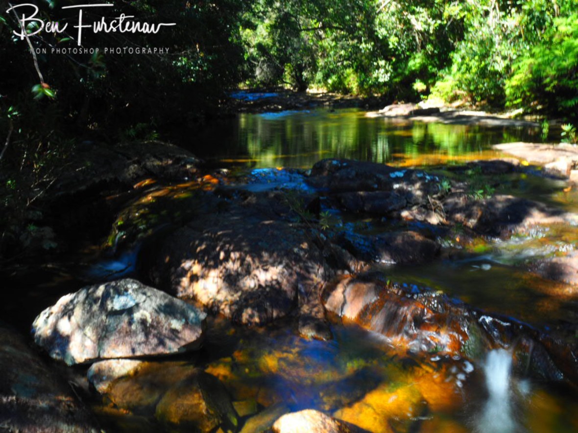 Gently cascading down at Birthday Creek Falls, Northern Queensland, Australia 
