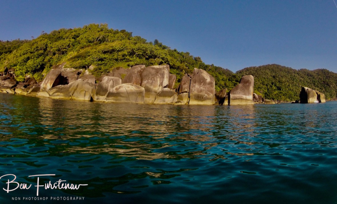 Cruising through calm waters along Dunk Island’s Easter Coastline, Mission Beach, Tropical Queensland, Australia 