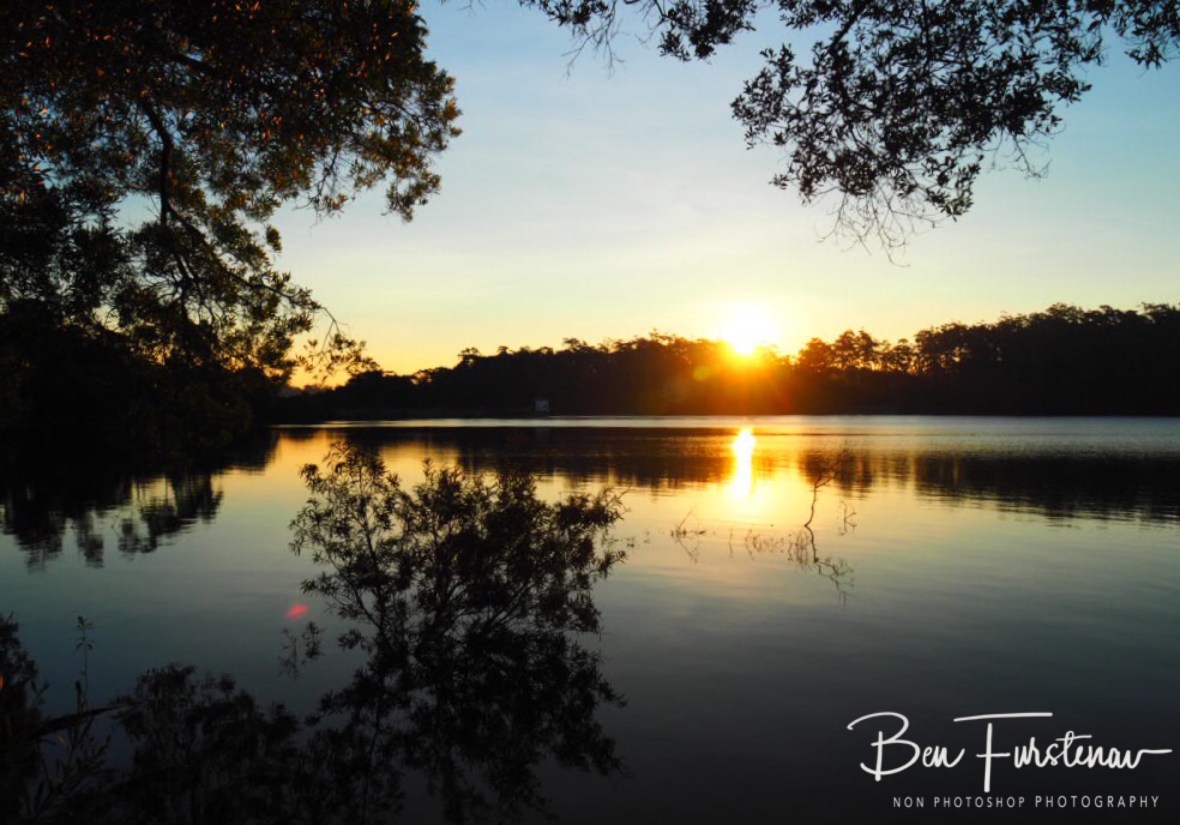 The sun’s last warning  rays at Lake Paluma, Northern Queensland, Australia 