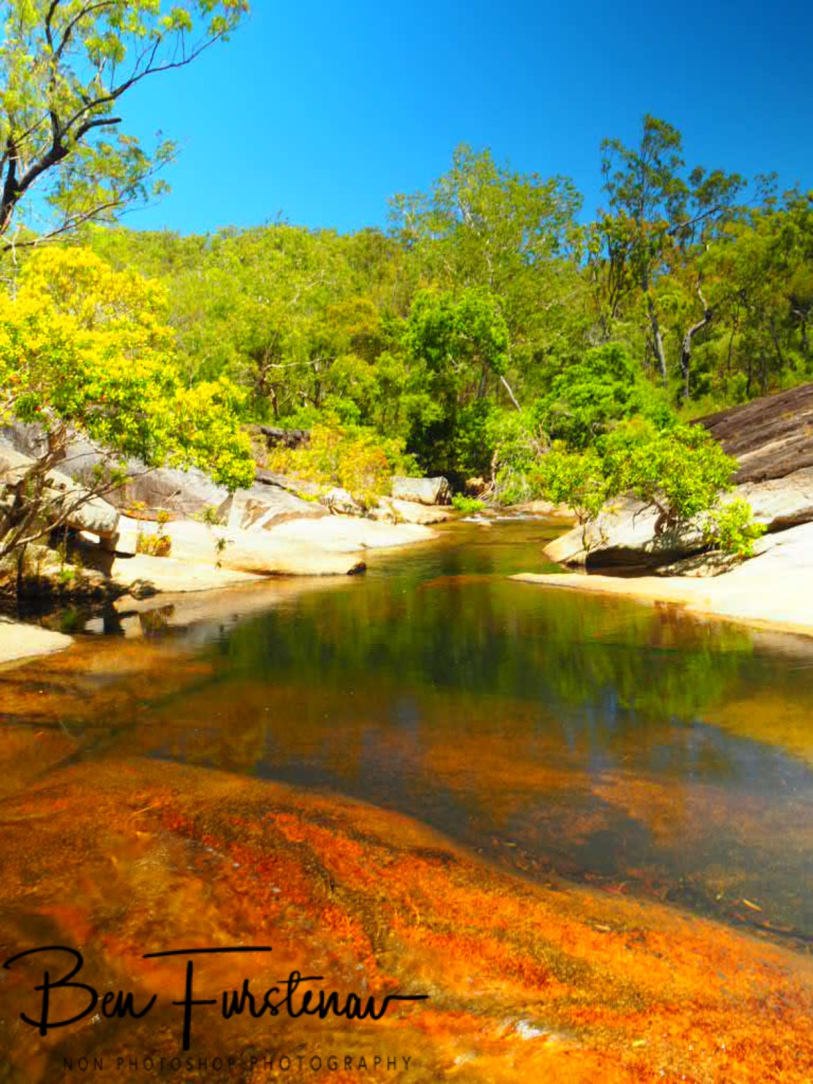 Rainbow colours at Davies Creek Falls, Atherton Tablelands, Far North Queensland, Australia 