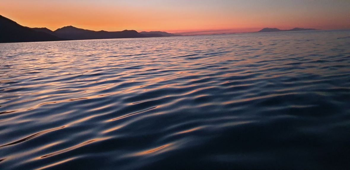 Sunset view over the Great Dividing Range at Palm Cove, Tropical Queensland, Australia 