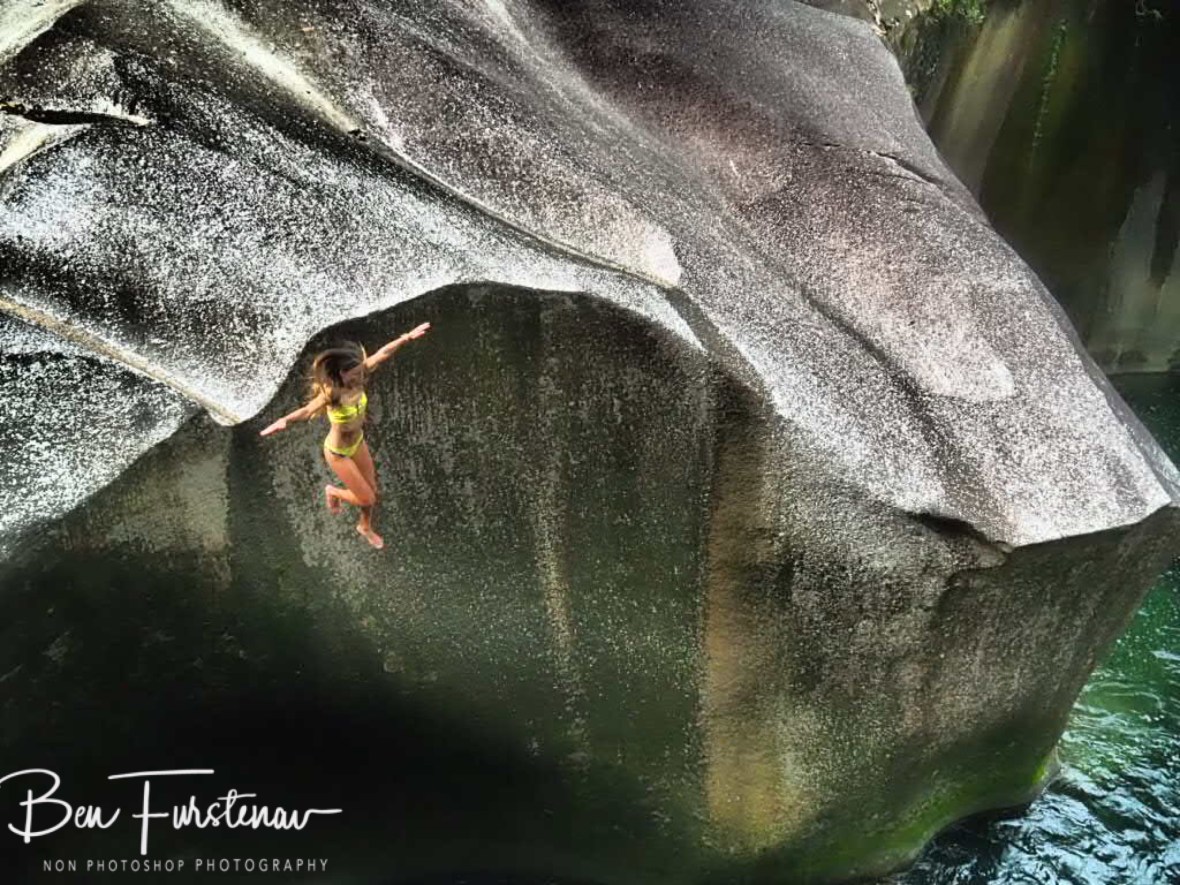 Boulder jumping in style at Babinda, Tropical Northern Queensland, Australia